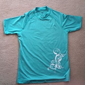 Women's short sleeve UPF 50+ swim/rash guard. Medium.